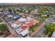 An aerial view of a house with a pool and a large yard, surrounded by other homes at 901 W Culver St, Phoenix, AZ 85007