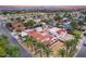 Aerial view of a house with a pool, surrounded by palm trees and other homes at 901 W Culver St, Phoenix, AZ 85007