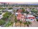 Aerial view of a house with pool, surrounded by palm trees and other houses at 901 W Culver St, Phoenix, AZ 85007