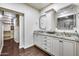 Spa-like bathroom with double vanities, granite countertops, and an adjacent closet at 901 W Culver St, Phoenix, AZ 85007