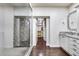 Modern bathroom with a large glass shower and granite countertops at 901 W Culver St, Phoenix, AZ 85007