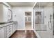 Elegant bathroom with granite countertops, updated cabinets, and a large walk-in shower at 901 W Culver St, Phoenix, AZ 85007