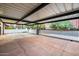 Covered carport with gated entry and view of neighborhood at 901 W Culver St, Phoenix, AZ 85007