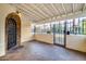 Covered entryway with wrought iron gate and stone details at 901 W Culver St, Phoenix, AZ 85007