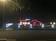 Night view of charming house decorated for the holidays with festive lights at 901 W Culver St, Phoenix, AZ 85007