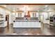 Gourmet kitchen with granite countertops, custom cabinetry, and a large island at 901 W Culver St, Phoenix, AZ 85007