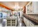 Updated kitchen with granite countertops, stainless steel appliances, and custom cabinetry at 901 W Culver St, Phoenix, AZ 85007