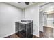 Bright laundry room, featuring modern washer and dryer, and ample closet space at 901 W Culver St, Phoenix, AZ 85007
