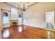 Elegant living room featuring hardwood floors, a fireplace, and large windows at 901 W Culver St, Phoenix, AZ 85007