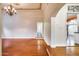 Bright living room with hardwood floors and views to hallway and kitchen at 901 W Culver St, Phoenix, AZ 85007