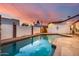 Inviting swimming pool with surrounding patio at sunset at 901 W Culver St, Phoenix, AZ 85007