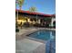 Inviting backyard oasis with a sparkling pool and covered patio area at 901 W Culver St, Phoenix, AZ 85007