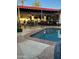 Relaxing pool area with patio furniture under a covered patio at 901 W Culver St, Phoenix, AZ 85007