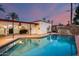 Relaxing pool with covered patio and built-in barbecue at 901 W Culver St, Phoenix, AZ 85007