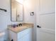 Bathroom with a granite countertop vanity and modern fixtures at 955 Calle Azul --, Wickenburg, AZ 85390