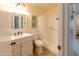 Clean bathroom with white vanity, bathtub, and toilet at 10103 W Forrester Dr, Sun City, AZ 85351