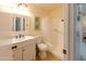 Clean bathroom with white vanity, bathtub, and toilet at 10103 W Forrester Dr, Sun City, AZ 85351