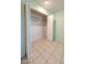 Double-door closet with shelving and hanging rod at 10103 W Forrester Dr, Sun City, AZ 85351