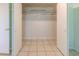 Double-door closet with shelving and hanging rod at 10103 W Forrester Dr, Sun City, AZ 85351