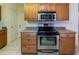 Stainless steel range and microwave in kitchen at 10103 W Forrester Dr, Sun City, AZ 85351