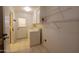 Laundry room with washer, dryer, and exterior access at 10103 W Forrester Dr, Sun City, AZ 85351