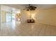 Bright living room with tile floors and ceiling fan at 10103 W Forrester Dr, Sun City, AZ 85351