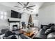 Living room with hardwood floors, fireplace, and Christmas tree at 1206 W Monroe St, Phoenix, AZ 85007