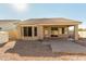 Backyard features a covered patio and a large gravel area at 1362 E Shannon St, Chandler, AZ 85225