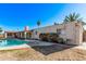 Home with refreshing pool and diving board at 1622 E Hope St, Mesa, AZ 85203