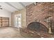 Brick fireplace with decorative screen in living room at 1622 E Hope St, Mesa, AZ 85203