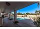 Relaxing pool area with covered patio at 1622 E Hope St, Mesa, AZ 85203