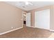 Bedroom with carpet, ceiling fan, and en-suite bathroom at 1864 W Buckhorn Trl, Phoenix, AZ 85085
