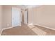 Spacious bedroom with neutral walls and carpet flooring at 1864 W Buckhorn Trl, Phoenix, AZ 85085