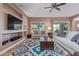 Living room with access to backyard and kitchen at 1864 W Buckhorn Trl, Phoenix, AZ 85085