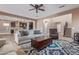 Open living room with a view of the kitchen and stairs at 1864 W Buckhorn Trl, Phoenix, AZ 85085
