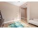 Home office with built-in shelving and comfortable seating at 1864 W Buckhorn Trl, Phoenix, AZ 85085