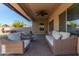Relaxing backyard patio with seating area and hot tub at 1864 W Buckhorn Trl, Phoenix, AZ 85085