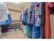 Large walk-in closet with ample shelving and hanging space at 1864 W Buckhorn Trl, Phoenix, AZ 85085