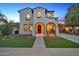 Beautiful two-story home with a charming facade and well-manicured lawn at 20385 W Terrace Ln, Buckeye, AZ 85396