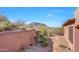 Landscaped backyard with mountain views and a stone pathway at 24686 N 120Th Pl, Scottsdale, AZ 85255
