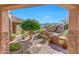 Landscaped backyard with built-in grill and mountain views at 24686 N 120Th Pl, Scottsdale, AZ 85255