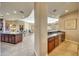 Convenient bar area connecting kitchen and living room at 24686 N 120Th Pl, Scottsdale, AZ 85255