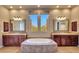 Spa-like bathroom with double vanities and large soaking tub at 24686 N 120Th Pl, Scottsdale, AZ 85255