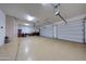 Spacious two-car garage with overhead storage at 24686 N 120Th Pl, Scottsdale, AZ 85255