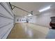 Bright garage with additional storage cabinets at 24686 N 120Th Pl, Scottsdale, AZ 85255