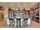 Gourmet kitchen with granite countertops and large island at 24686 N 120Th Pl, Scottsdale, AZ 85255