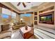 Comfortable living area with large windows and a cozy atmosphere at 24686 N 120Th Pl, Scottsdale, AZ 85255