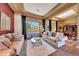 Open concept living and dining area with large windows and natural light at 24686 N 120Th Pl, Scottsdale, AZ 85255