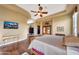 Main bedroom with hardwood floors and large windows at 24686 N 120Th Pl, Scottsdale, AZ 85255