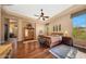 Large main bedroom with hardwood floors and access to a luxurious bath at 24686 N 120Th Pl, Scottsdale, AZ 85255